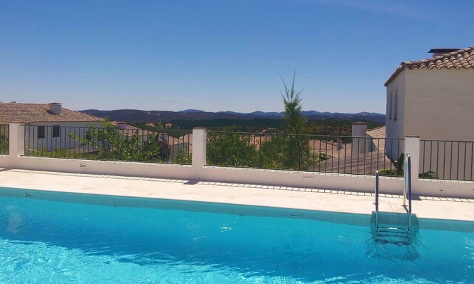 Higuera de la Sierra Villa | charming rustic house in development with pool. Perfect for family