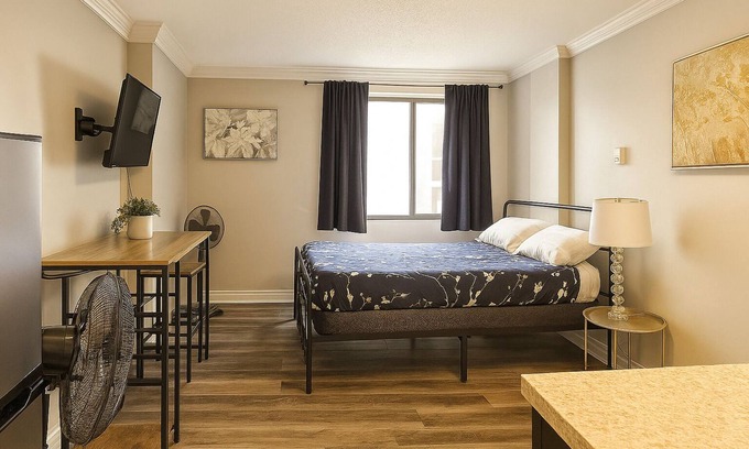 Eau Claire Apartment | Charming Vintage Studio Escape in Downtown Calgary