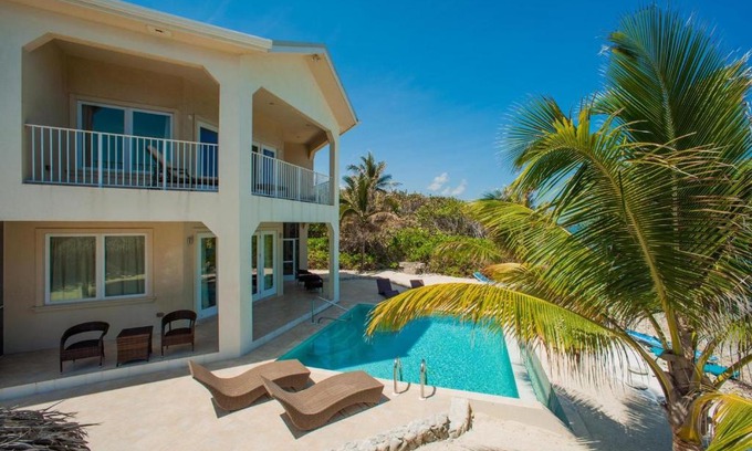 Old Man Bay House | Christmas Palms by Grand Cayman Villas & Condos