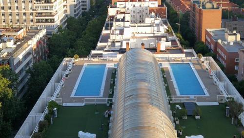 Cuatro Caminos Apartment | Chusbad place zona Cuzco-Santiago Bernabéu Edificio Eurobuilding 2