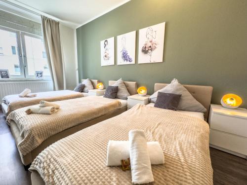 Sudstadt-Bult Apartment | Citynah, Balkon, große Küche und Garten