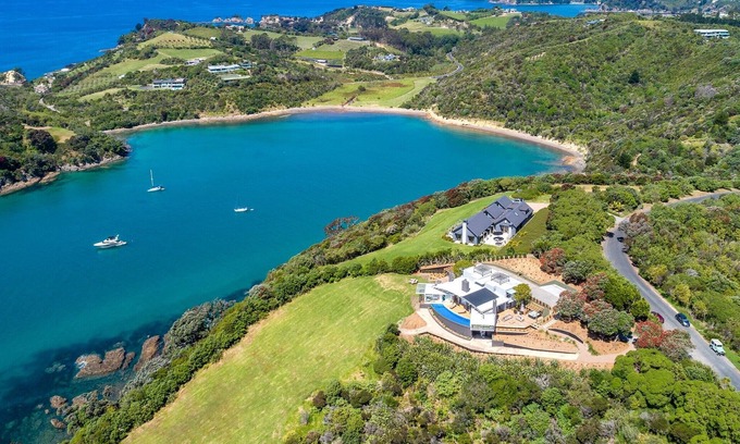 Matiatia Bay House | Cliff seated with fabulous sea views, a solar heated pool and a new spa pool!