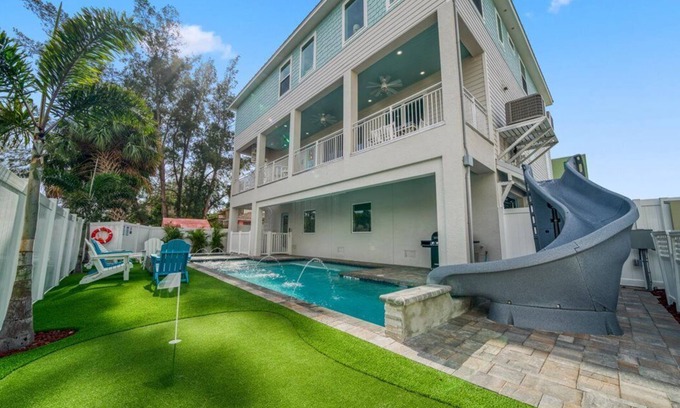 Indian Shores House | Coastal Breeze - 90 seconds from door to sand. Heated pool with slide & spa.