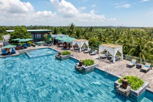 Tu Nghia Resort | CocoLand Thu Xa Ancient Town Resort