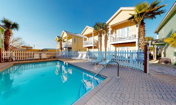Sago Park Townhomes House | Colorful Beach House with Outdoor Pool, WiFi, Washer/Dryer, & Central A/C