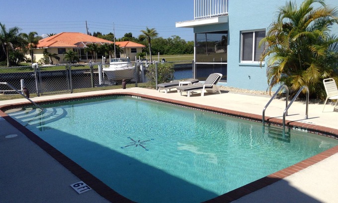 Punta Gorda Condo | Come Home to Paradise in Punta Gorda Isles. Waterfront Dock Heated Pool Quiet