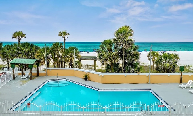Panama City Beach Hotel | Comfort and Relaxation! 2 Pet-friendly Units, Beachfront Property w/Pool