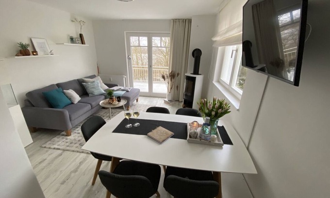 Lietzow Apartment | Comfortable vacation apartment with balcony, sauna and Bodden view