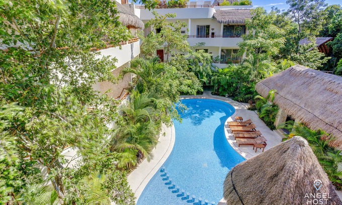 Zama Apartment | Condo Complex with an Alluring Pool & Tropical Vibes by Stella Rentals