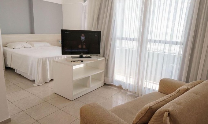 Areia Preta Apartment | Confortável suíte integrada com vista mar em Natal por Carpediem