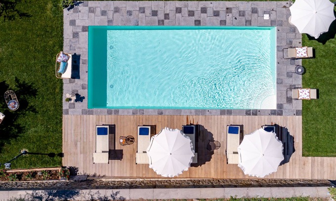 Cortona Villa | Corte della Luna, elegant villa with swimming pool surrounded by a suggestive olive grove