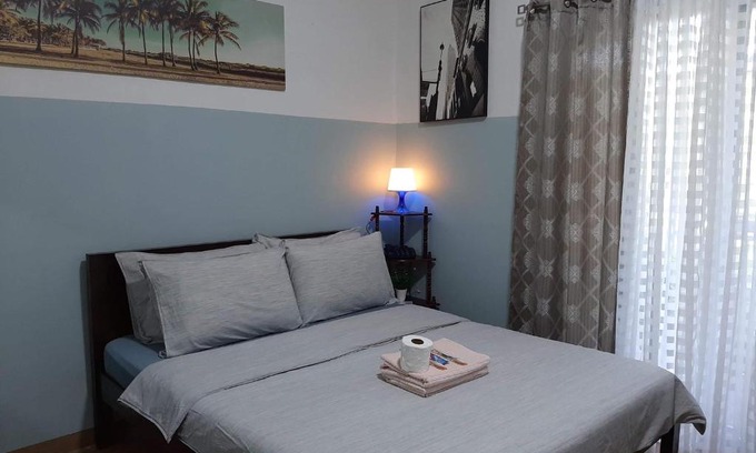 Mactan Export Processing Zone Apartment | Cozy condo unit 5mins from Mactan Cebu Int'l Airport with Netflix