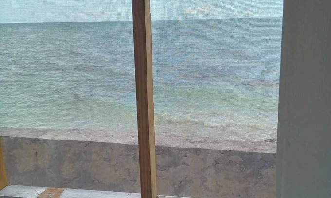 Andros Town House | Cozy cottage with AC, Washer & dryer, spacious, situated on the beach.