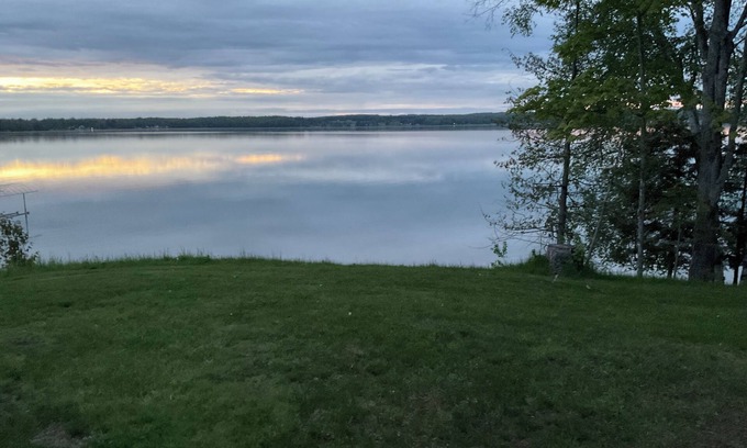 McMillan Cottage | Cozy couples camper with your own private 100ft lake front.