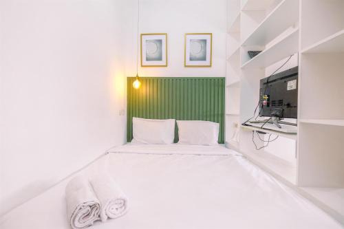 Tajur Halang Apartment | Cozy Living Studio Room Royal Sentul Park Apartment By Travelio