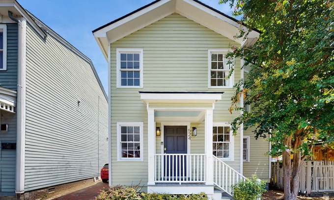 Beach Institute Apartment | Cozy retreat with shared outdoor dining area, modern comforts & reading nook
