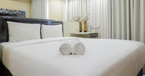 Surabaya Apartment | Cozy Studio at Tamansari Papilio Apartment By Travelio