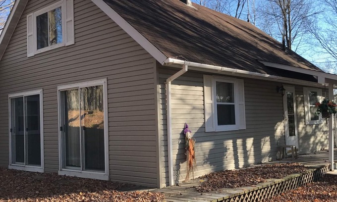 Lakewood House | Cozy vacation home nestled in a quiet wooded area. Near town but private