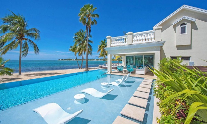 Rum Point House | Crystal Waters: Luxe Villa w/Private Pool, Dock and Barefoot Beach Lounge - Walk to The Kaibo!