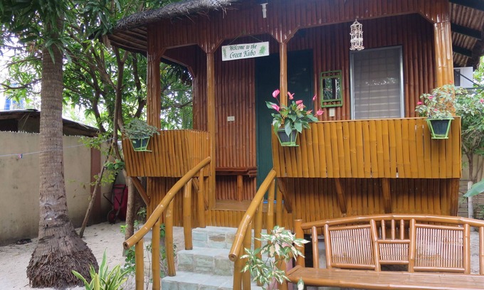 Roxas Cottage | Cute, cool Green Kubo near the beach