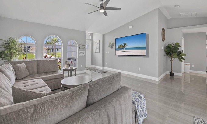 Pelican House | Deja Blue Villa | Canal Front + Screened-In Private Heated Pool