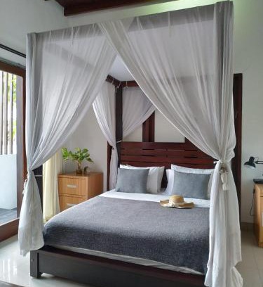 By Pass Ngurah Rai Bed & Breakfast | Dim House Jimbaran