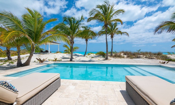 Jimmy Hill Villa | Directly on the beach with newly installed generator and heated pool!