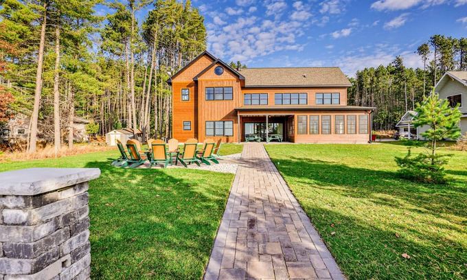 St Germain House | Dog-friendly lakefront home with firepit, 2 grills, fireplace, dock, & kayaks