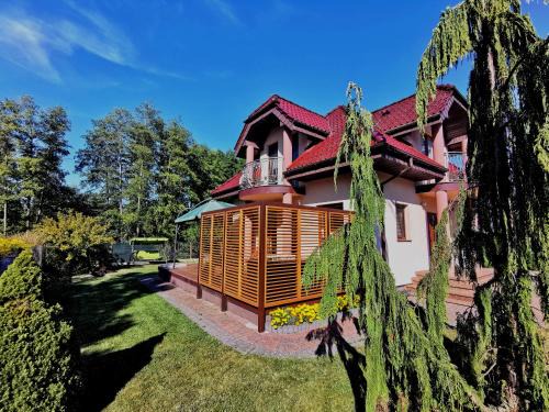 Szczytno Villa | Domek wypoczynkowy Zielonka Szczytno