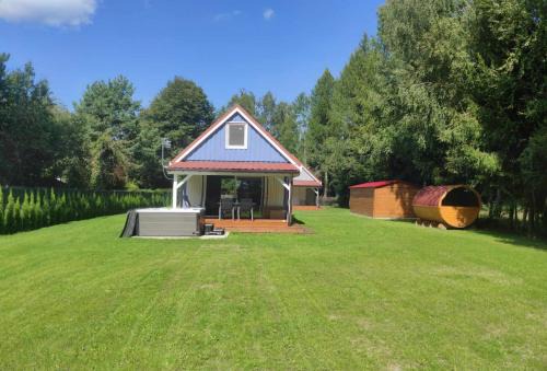 Pisz House | Domek z jacuzzi,kajaki i rowery,sauna -Malinowy Reset