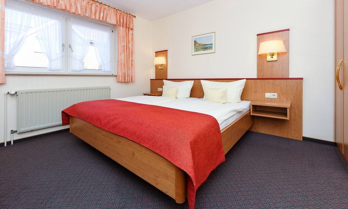 Esens Cottage | Doppelzimmer Memmert - Pension Nordkap in Bensersiel