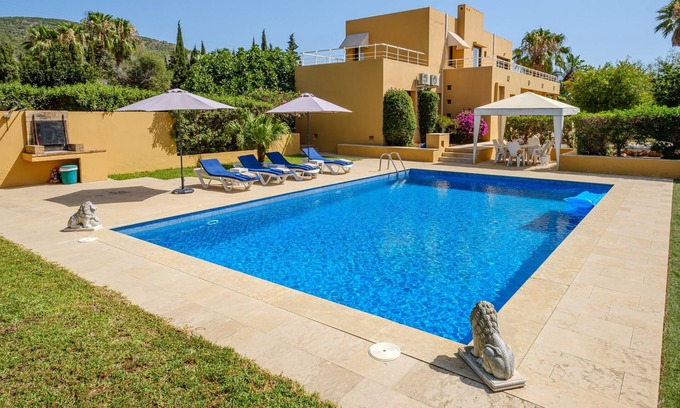 Sant Josep de sa Talaia Villa | Elegant Villa with Pool, Jacuzzi, Garden, Terrace, Air-Conditioning & Wi-Fi