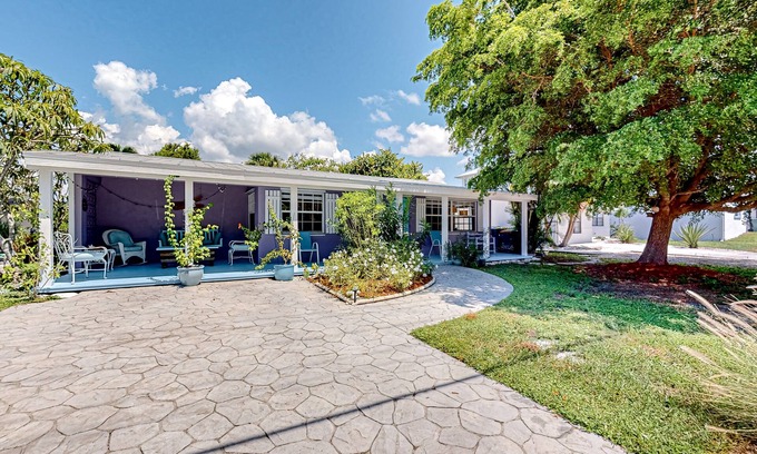 Isles of Capri House | Enchanting dog-friendly beach bungalow with patio, fireplace, deck, AC, & W/D