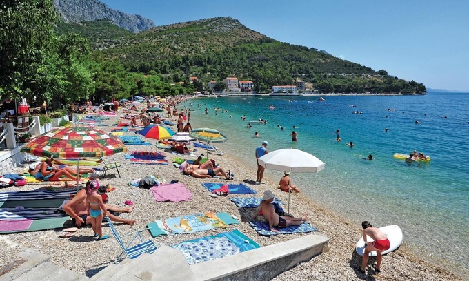 Vrgorac House | Enjoy a wonderful view of the countryside from this inviting vacation home with pool access.