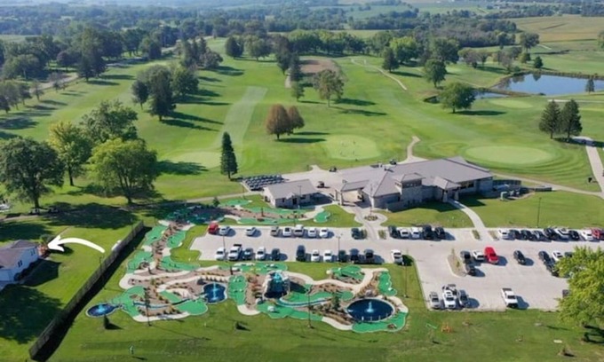 Altoona House | Enjoy golf course views with hot tub and fire pit.