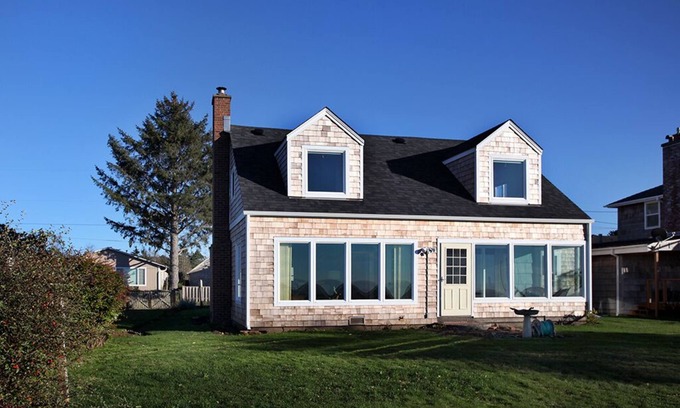 Seaside House | Enjoy Riverfront Views from the Porch, short drive to Beach and Promenade