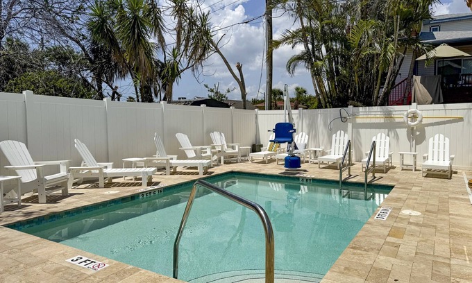 Madeira Beach Cottage | Entire Island Paradise Cottages – Heated Pool, Tiki Hut, Walk to Beach, 8 Units, Sleeps 30