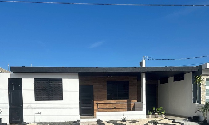 Fajardo House | Escape to Blissful Homes, where modern bohemian charm meets ultimate relaxation.