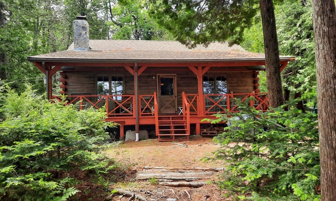 Willimantic Cabin | Escape to Howie's Camp: Unwind and Recharge at This Lakefront Log Cabin