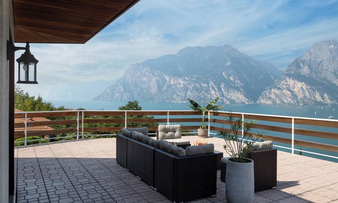 Torbole sul Garda Apartment | Exclusive residence in Torbole with breathtaking views, large terrace.