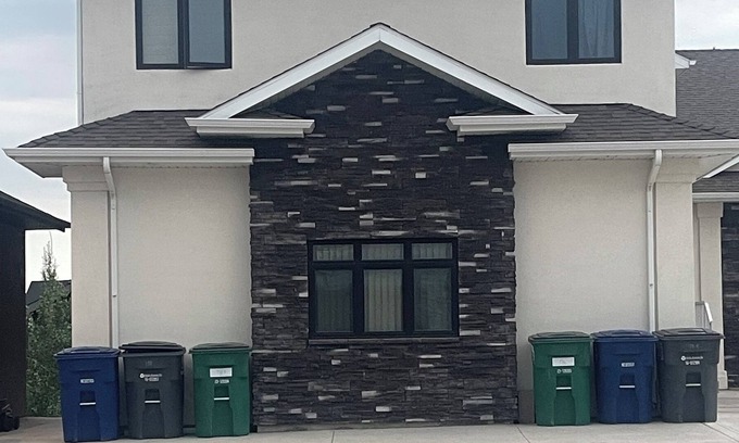 Saskatoon House | Executive 1BR+Den Walk-Out Suite Backing Park