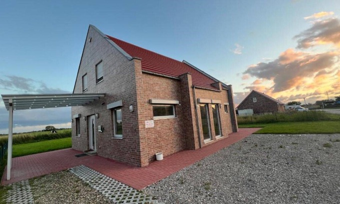 Eilsum Apartment | Exklusiver Platztraum, Sonnengeflutet, mit Weitblick Garten, Südbalkon/terrasse