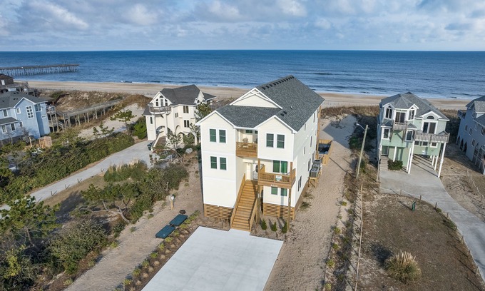 South Nags Head House | Experience luxury at 1 Perfect Vacation, a spacious oceanfront retreat in South Nags Head