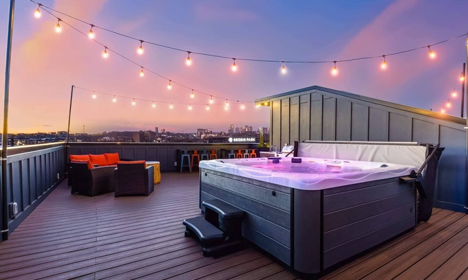 Hurwood Heights House | Fall rooftop hot tubs, two homes, game rooms near Broadway and Geodis Park