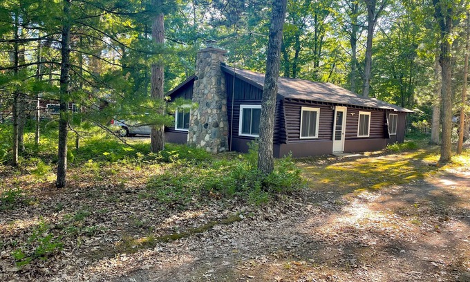 Rapid City Cottage | Family FUN: Torch Lake Cottage with Private Beach Access - Kayaks & SUP Provided
