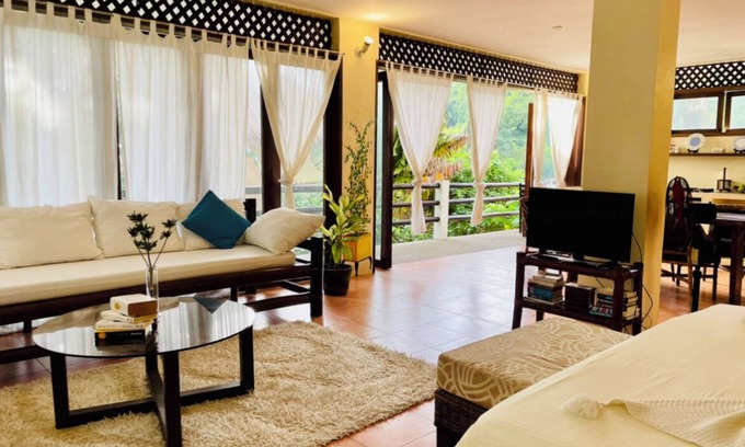 Balabag Apartment | Family Studio with panoramic windows to tropical greenery. 3 min to the beach