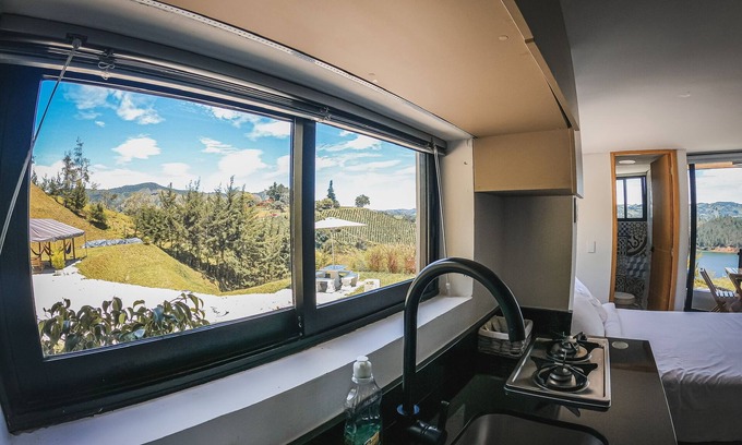 Guatape House | FARM BETWEEN PEÑOL AND GUATAPE. 3 JACUZZI AND 5 COMMON AREAS. AND SPECTACULAR VIEW.