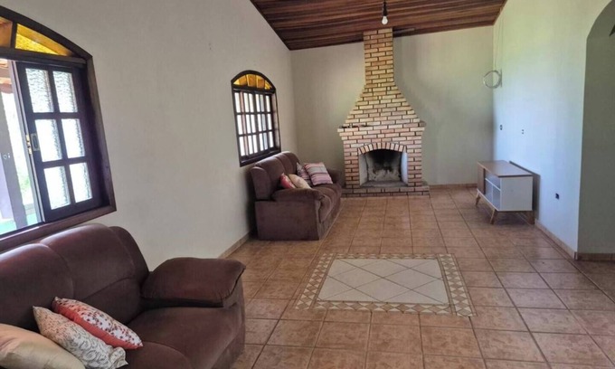 Mato do Gado House | Farm with swimming pool, fireplace and gourmet space surrounded by greenery.