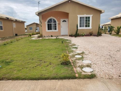 Portmore House | Finest Accommodation Phoenix Park Phase 4 Lot # 1348 Portmore St Catherine