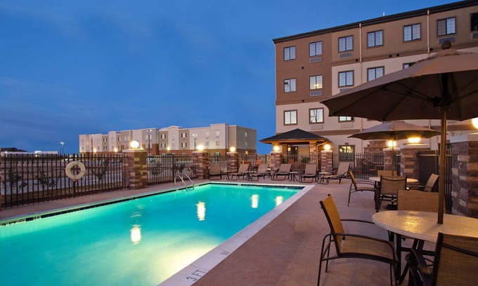 Odessa Apartment | Free Breakfast. Outdoor Pool. Gym. Quick Drive to the University of Texas Permian Basin!